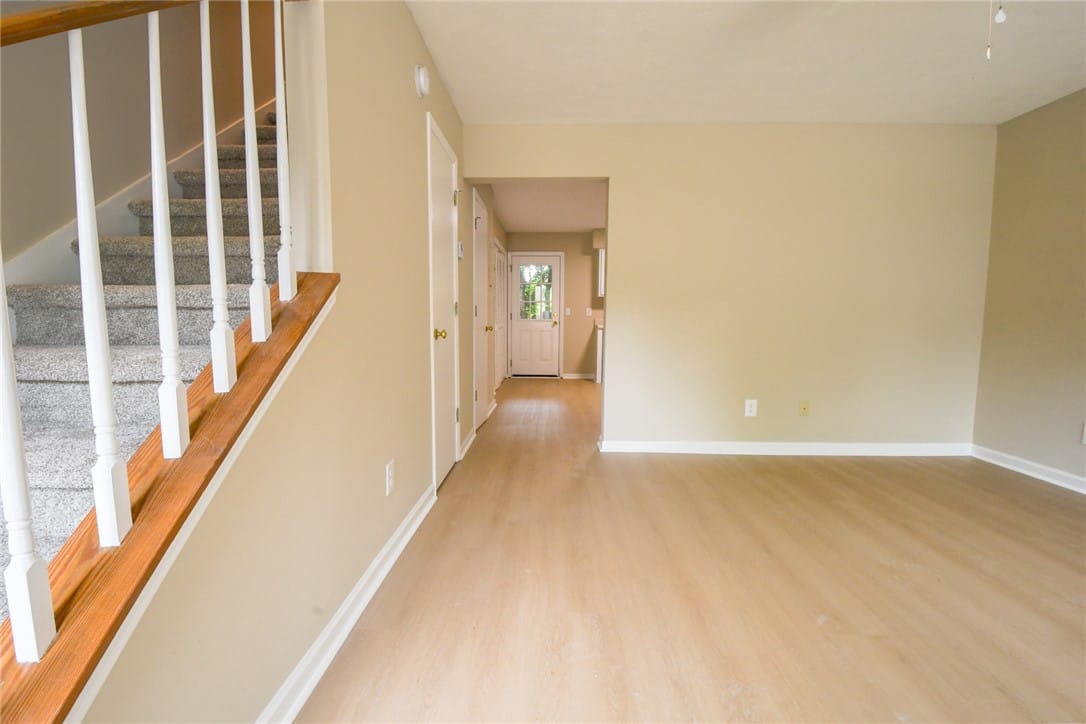 1022 Chinook St, Auburn, AL 36830, A graceful staircase with carpeted treads and natu