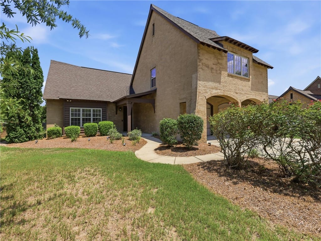 2615 Mimms Ln, Auburn, AL 36832, A graceful brick and stucco facade welcomes you ho