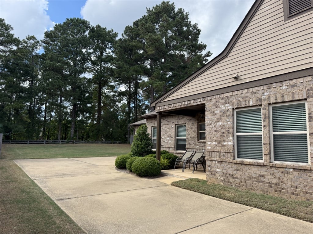 2630 Mimms Ln, Auburn, AL 36832, An expansive concrete patio highlights this classi