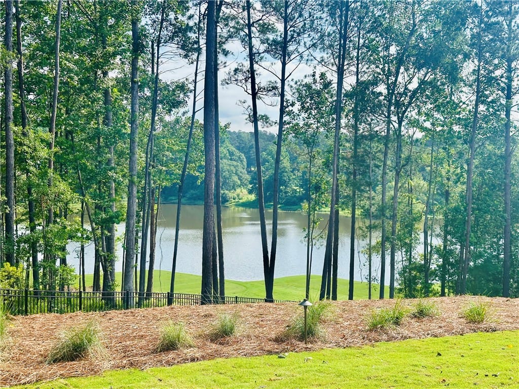 1320 Oakmont, Auburn, AL, 36830, A tranquil lake view unfolds beyond a verdant golf