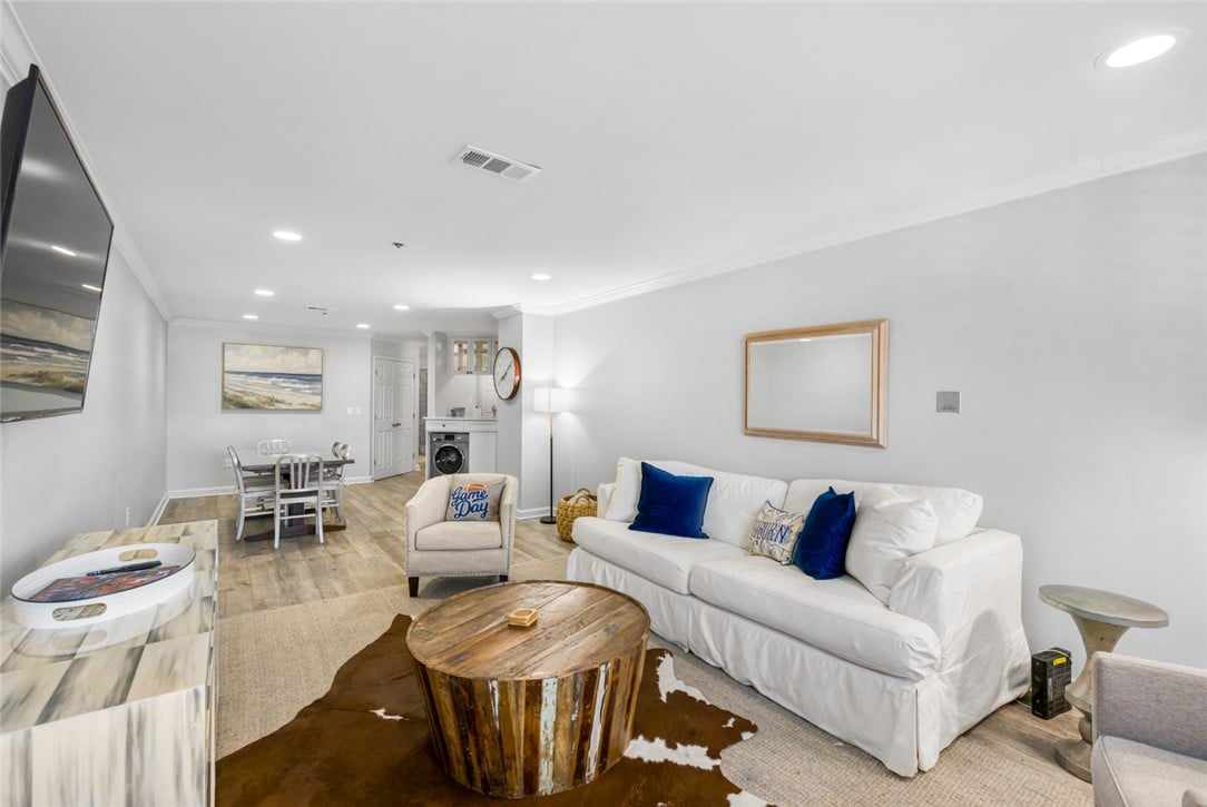 145 E Magnolia Ave Apt 310, Auburn, AL 36830, Smooth wood-look flooring and crown molding accent