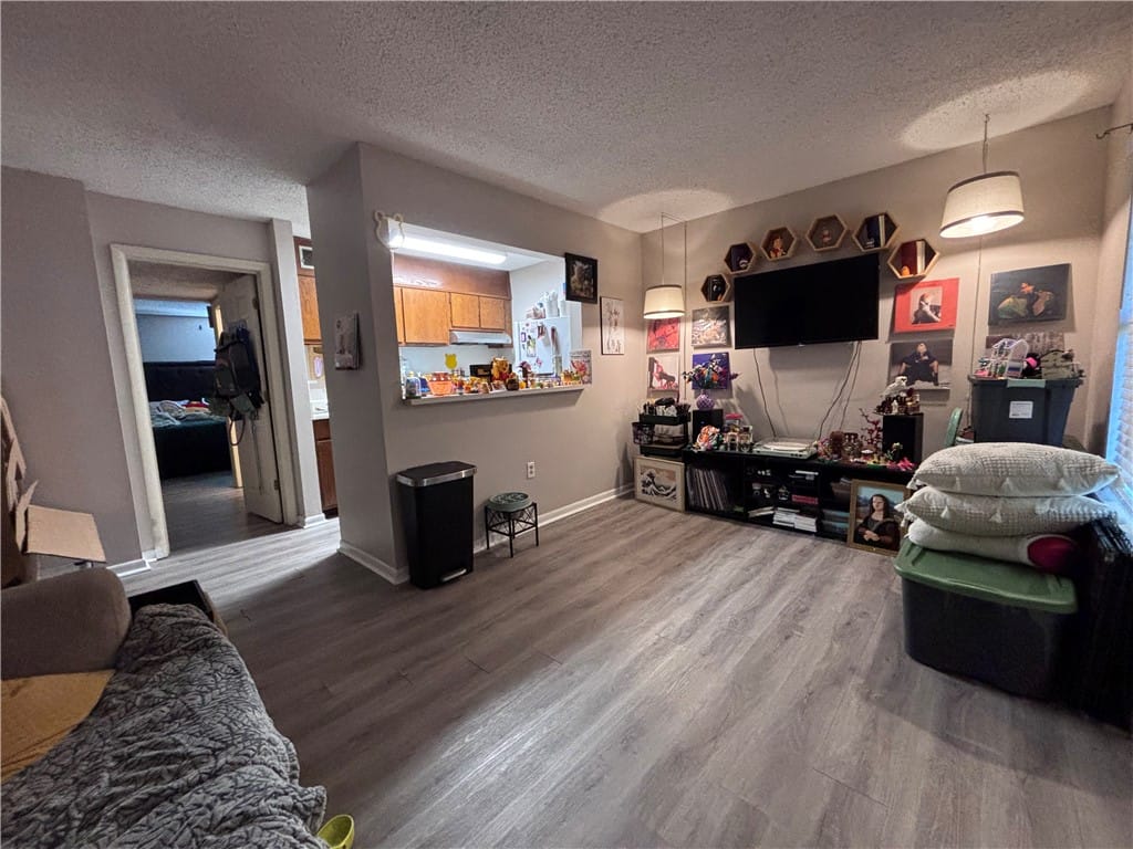 144 E University Dr k106, Auburn, AL 36832, Step into a sun-filled living space featuring dura