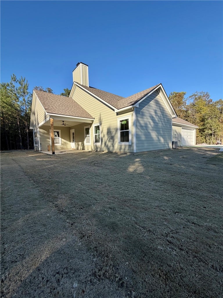 1836 Lee Rd 239, Smiths Station, AL 36877, An inviting covered patio highlights the rear exte