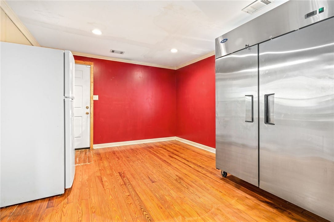 5304 20th Ave, Valley, AL 36854, Hardwood floors and vivid red walls define this ve