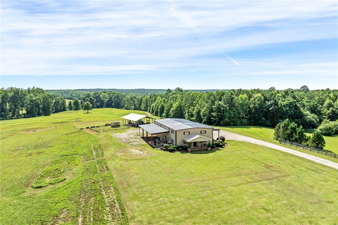 6171 Co Rd 9, La Fayette, AL 36862, A sweeping aerial view reveals a grand estate nest