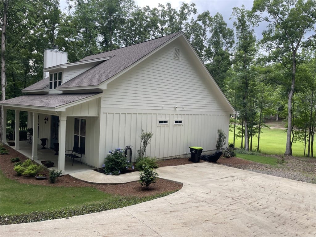 138 Greenview Ter, Dadeville, AL 36853, A charming farmhouse-style home with a welcoming f