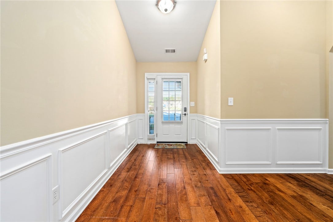 2708 Wyndham Gate Blvd, Opelika, AL 36804, Rich hardwood flooring complements classic wainsco
