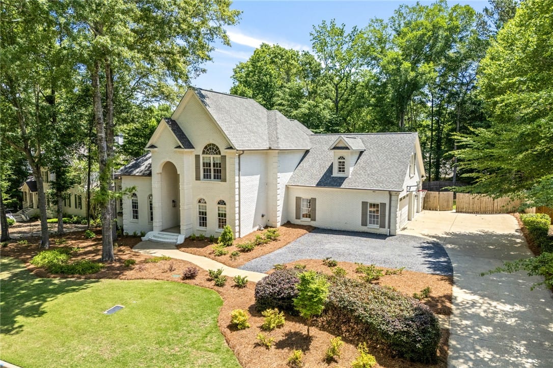 1657 Abby Rd, Auburn, AL 36830, USA, This classic white brick home boasts a lush green