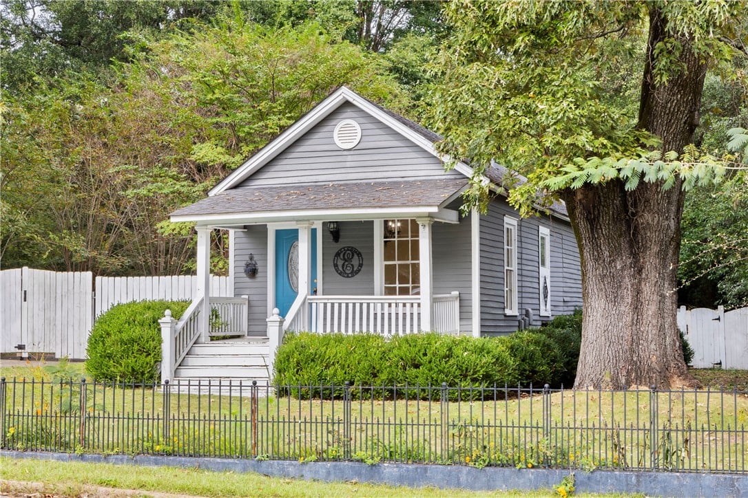 107 17th St, Opelika, AL 36801, A welcoming front porch leads into this classic co