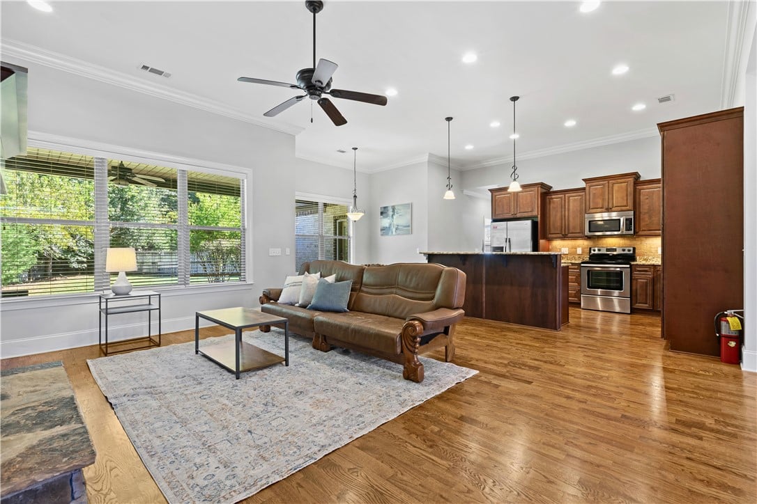 2306 Morgan Dr, Auburn, AL 36830, Rich hardwood floors sweep through this airy, open