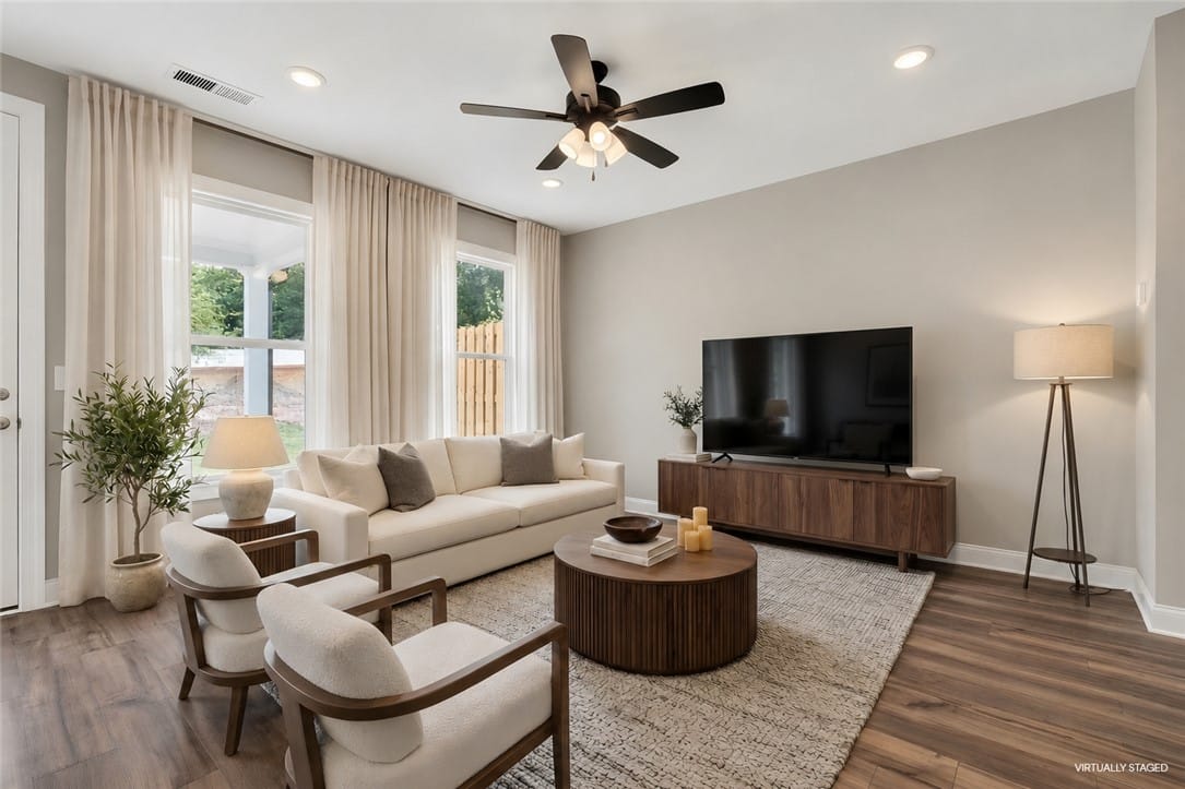 3511 FULLER, Opelika, AL, 36801, A well-lit living area showcases rich hardwood flo