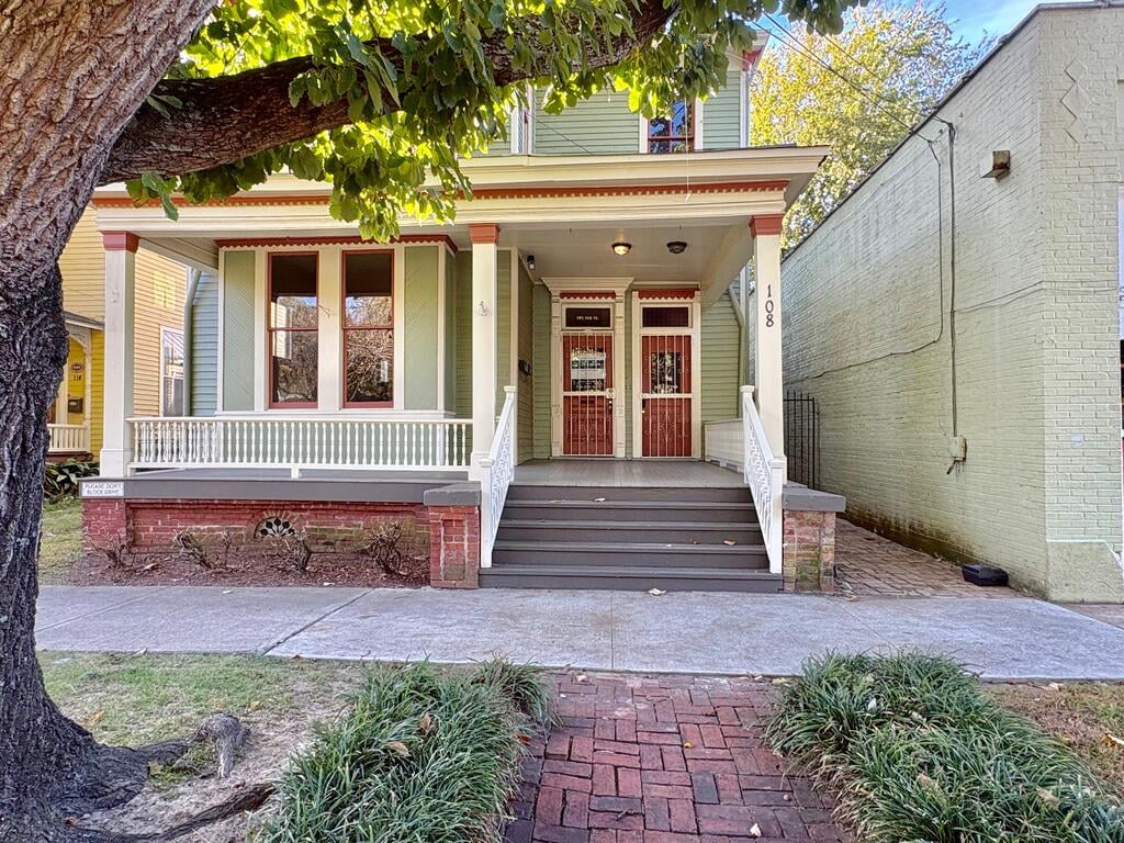 108 8th St, Columbus, GA 31901, front of the house left door goes to downstairs ap