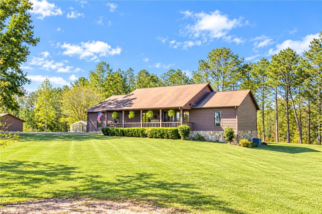 4351 Co Rd 282, Five Points, AL 36855, A spacious front lawn leads up to this rustic home