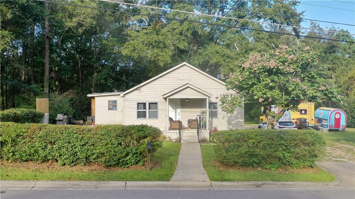 333 Byrd St, Auburn, AL 36832, Mature trees frame a charming classic cottage feat