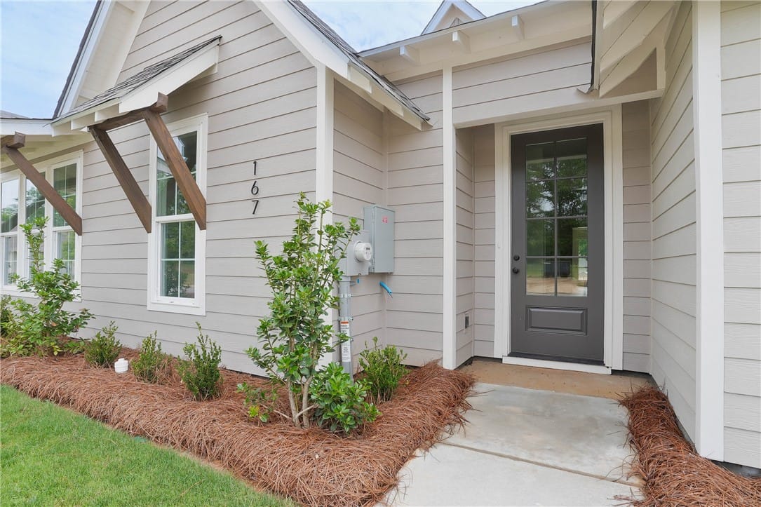 Opelika, AL, A welcoming entry features decorative wood accents