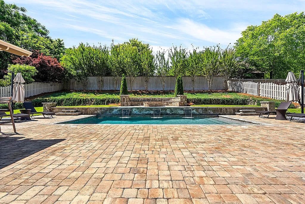 3205 Pinecrest Dr, Opelika, AL 36801, An inviting pool area awaits, framed by lush lands