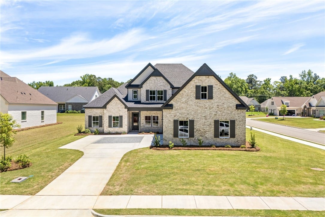 2677 Cool Stone Bnd Dr, Auburn, AL 36832, This charming home features a brick exterior and a