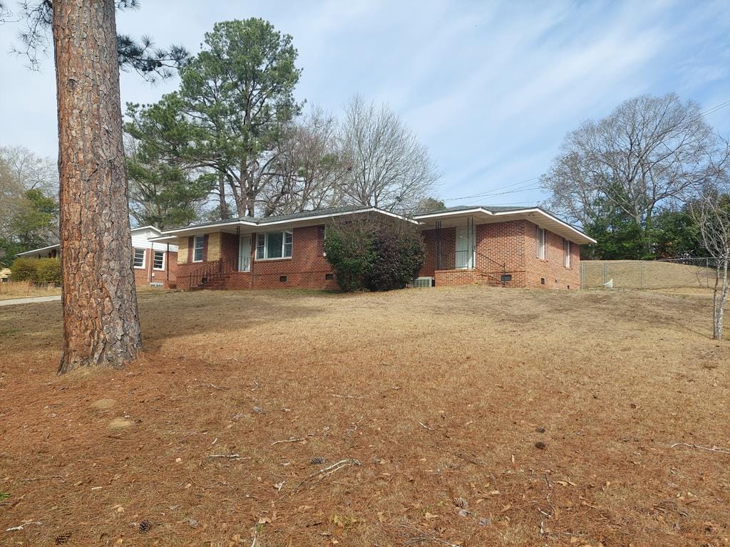 804 Lichfield Rd, Columbus, GA 31904, This pretty brick house sets on a large corner lot