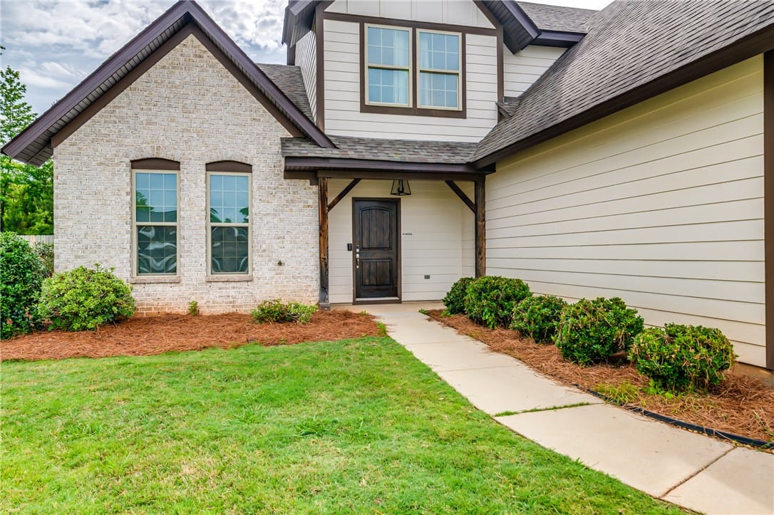 689 Shelton Cove Lane, Auburn, AL 36830, A welcoming entry features a dark wood door, contr