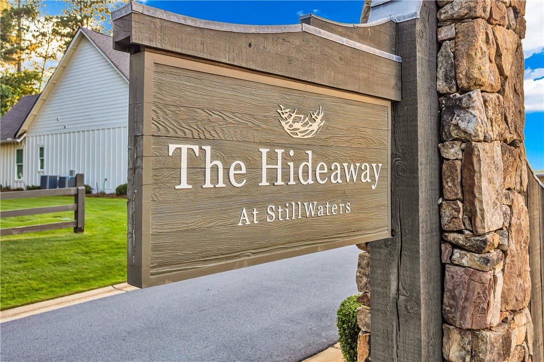 82 Hideaway Lp, Dadeville, AL 36853, Stone and wood accents welcome residents to "The H