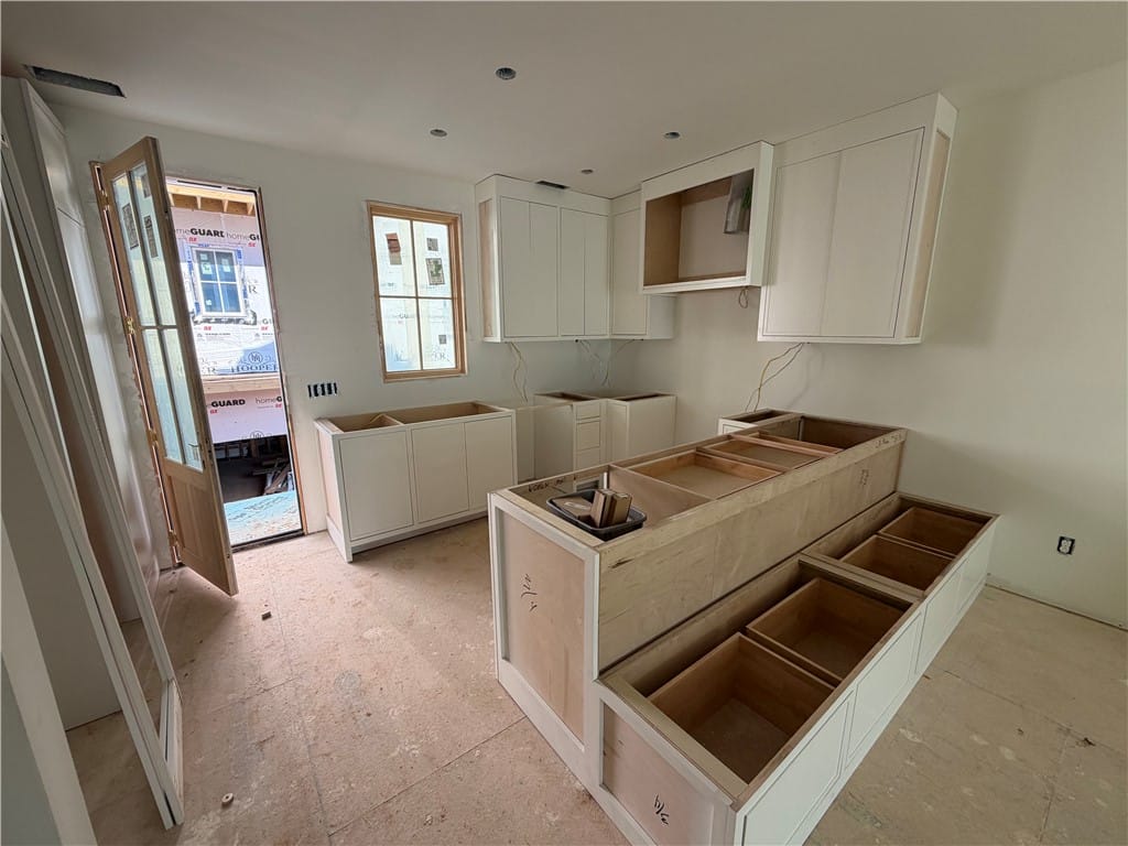 150 S Ross St #09, Auburn, AL 36830, A well-lit kitchen space awaits custom finishes, f