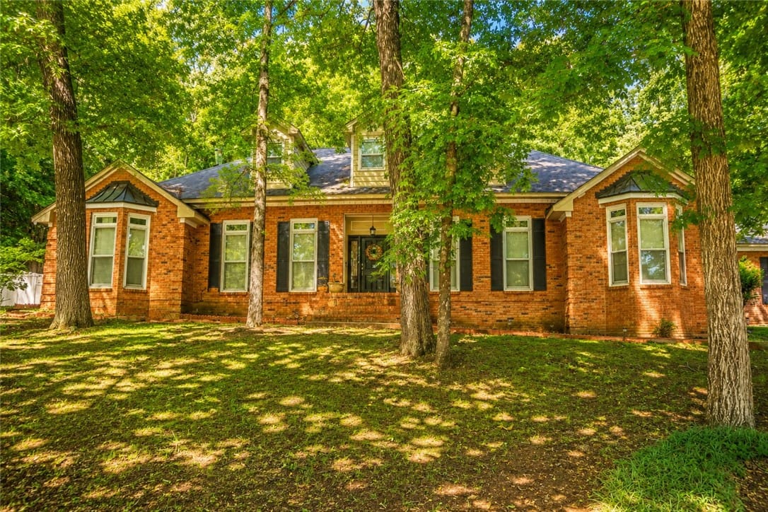 280 Willow Bend Dr, Wetumpka, AL 35010, Mature trees frame this traditional brick residenc