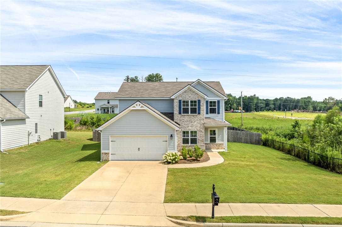2076 Sequoia Dr, Auburn, AL 36879, A well-kept lawn complements the inviting facade o