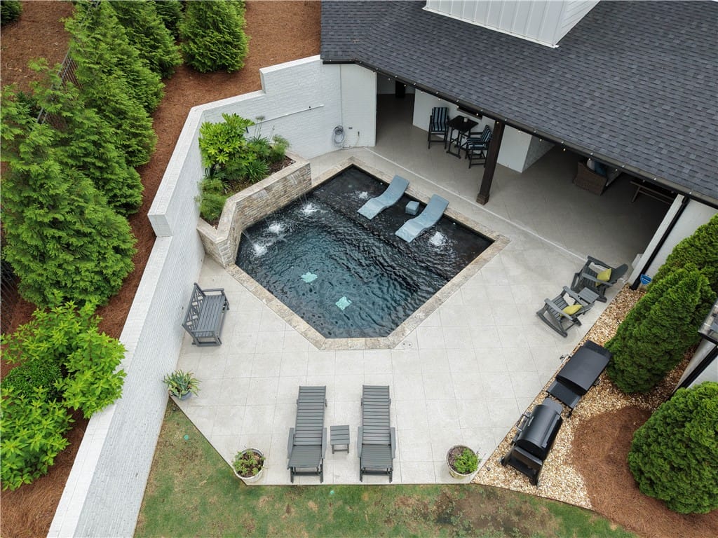 2615 Wilmington Ct #130, Auburn, AL 36830, An inviting backyard oasis awaits with a sparkling