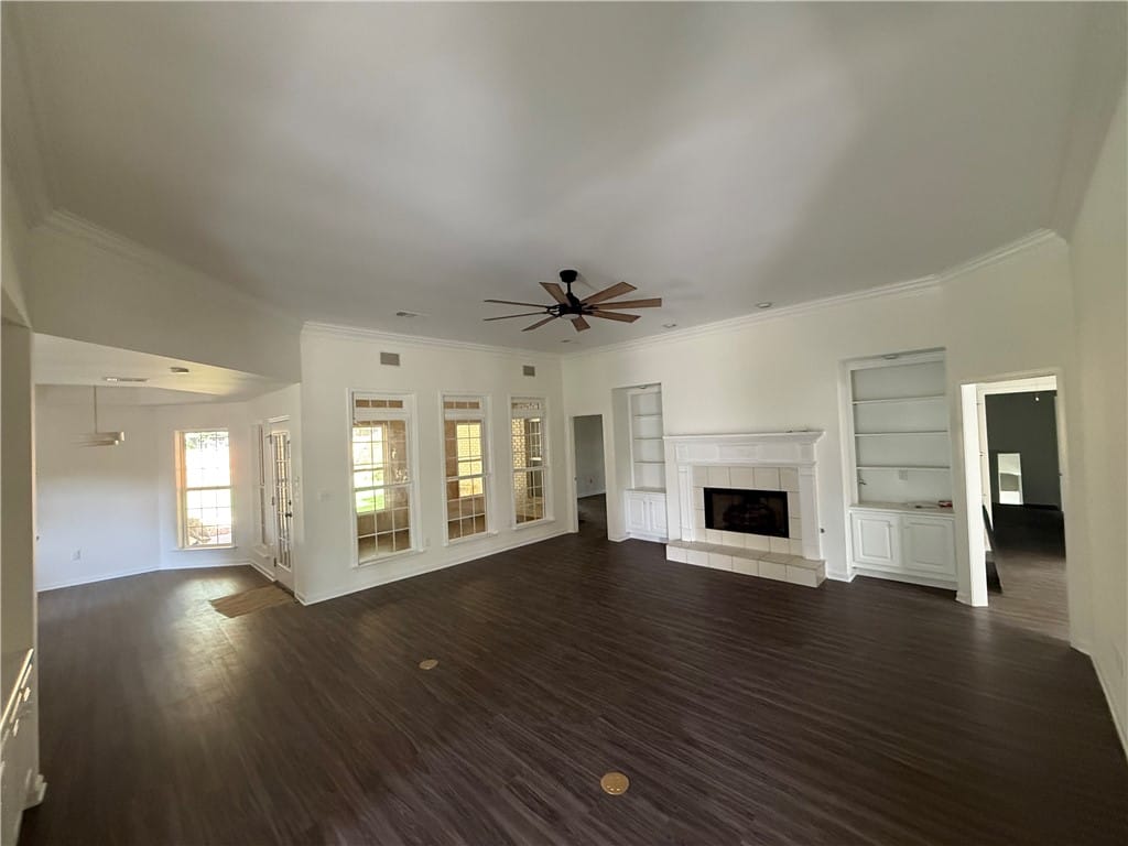 1788 Callaway Ct, Auburn, AL 36830, A spacious living area features elegant crown mold