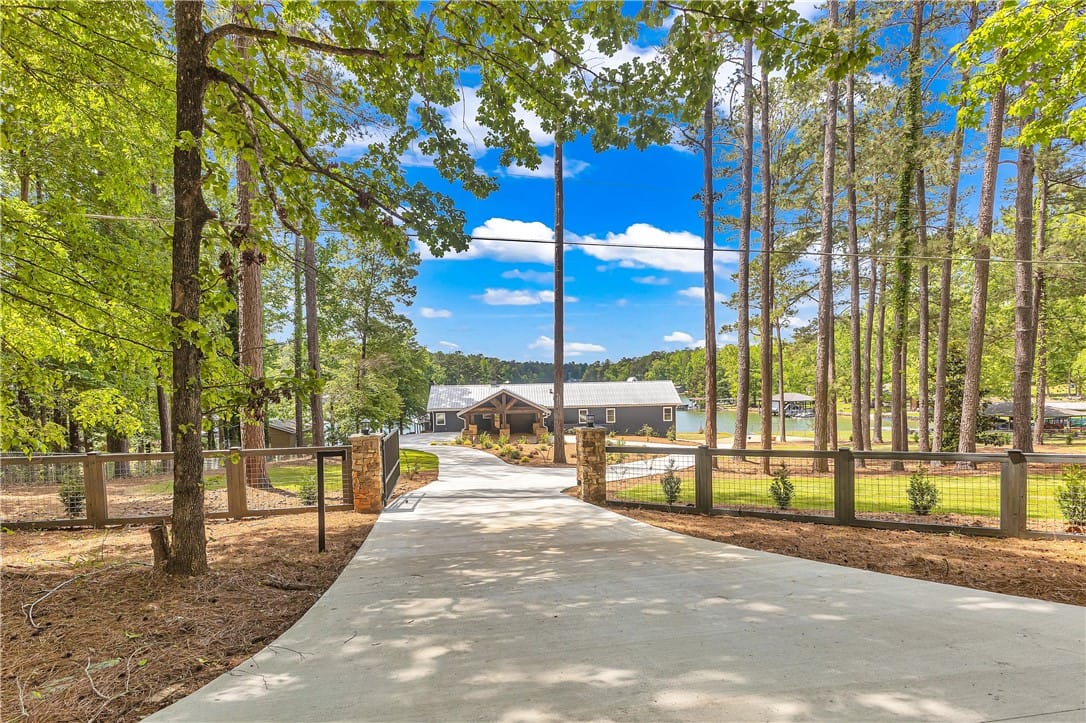 3320 Little Kowaliga Rd, Eclectic, AL 36024, USA, This private estate features a winding driveway le