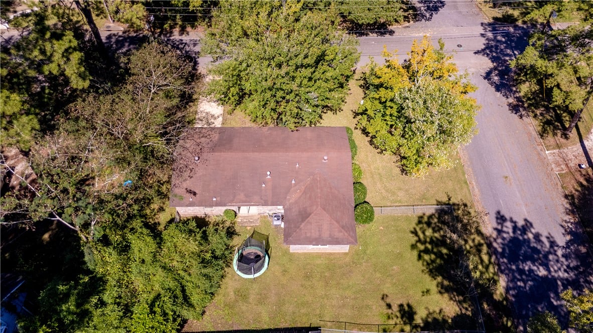 950 McKinley Ave, Auburn, AL 36830, Mature trees frame the property, offering a bird's