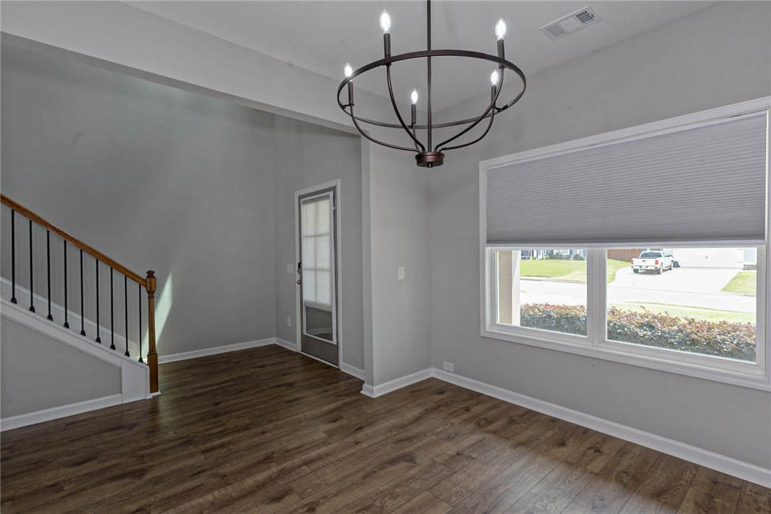 1050 Sawyer Dr, Opelika, AL 36801, Wood flooring and ample natural light define this
