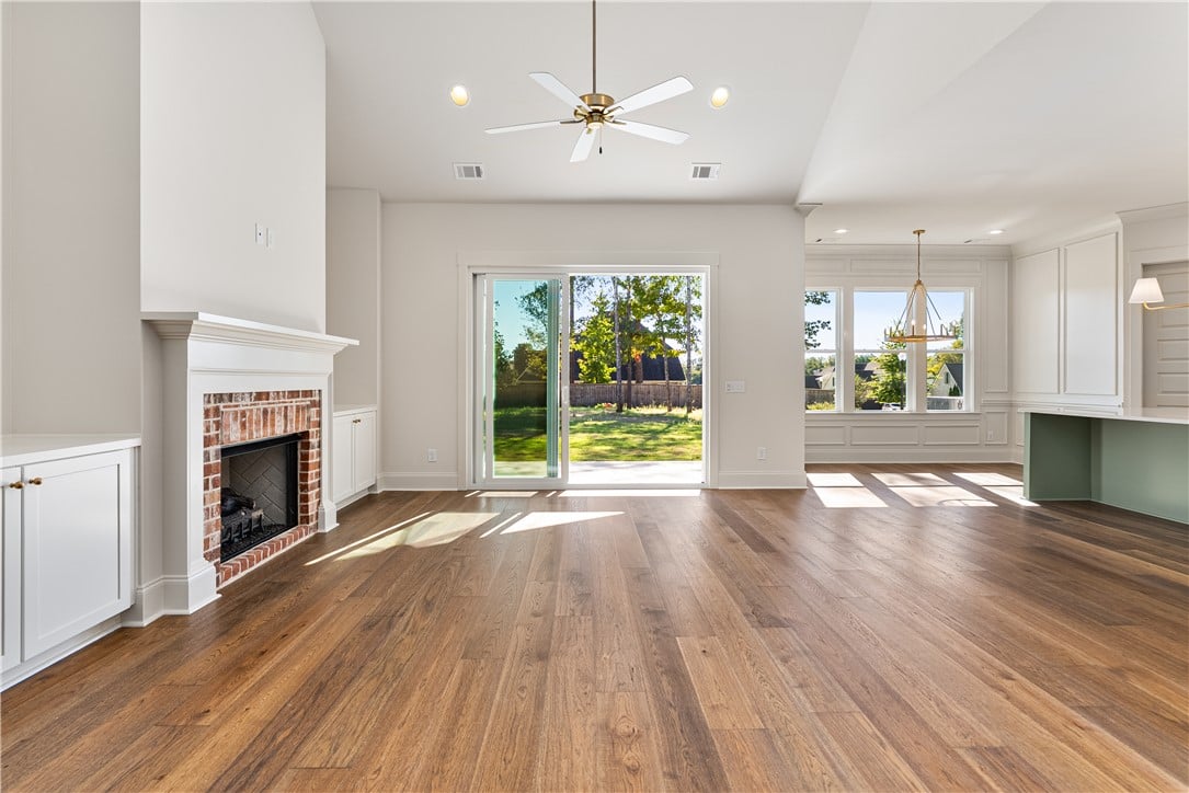 2351 Dalby Pl, Opelika, AL 36804, Gleaming hardwood floors and a brick fireplace anc