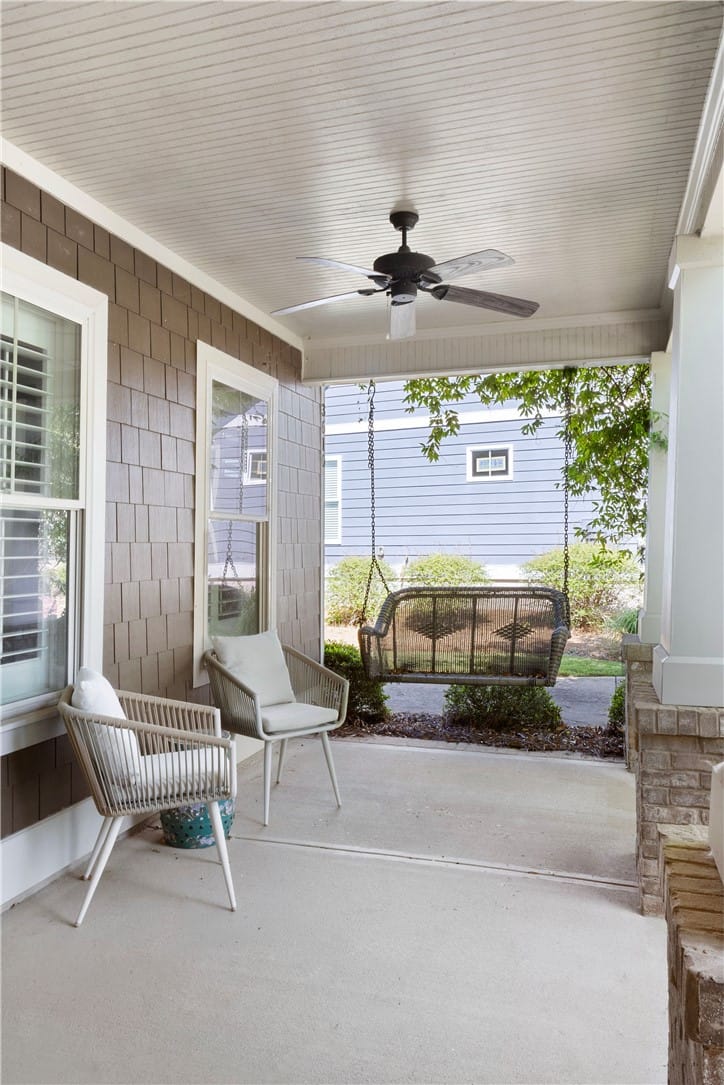 3610 Double Eagle Ln, Opelika, AL 36801, A welcoming covered porch with a ceiling fan and a