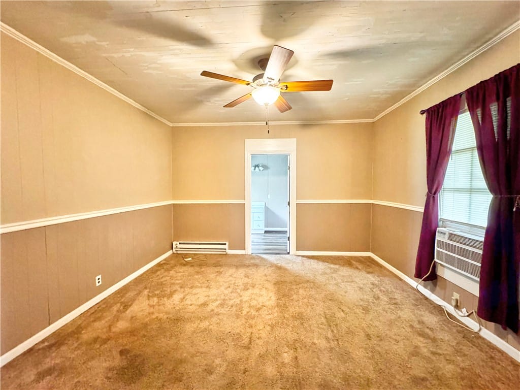 1533 MAIN, Roanoke, AL, 36274, This bright room features a practical ceiling fan