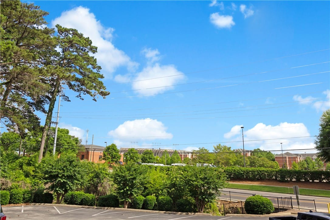 634 E Magnolia Ave #103, Auburn, AL 36830, Green landscaping surrounds this property, offerin