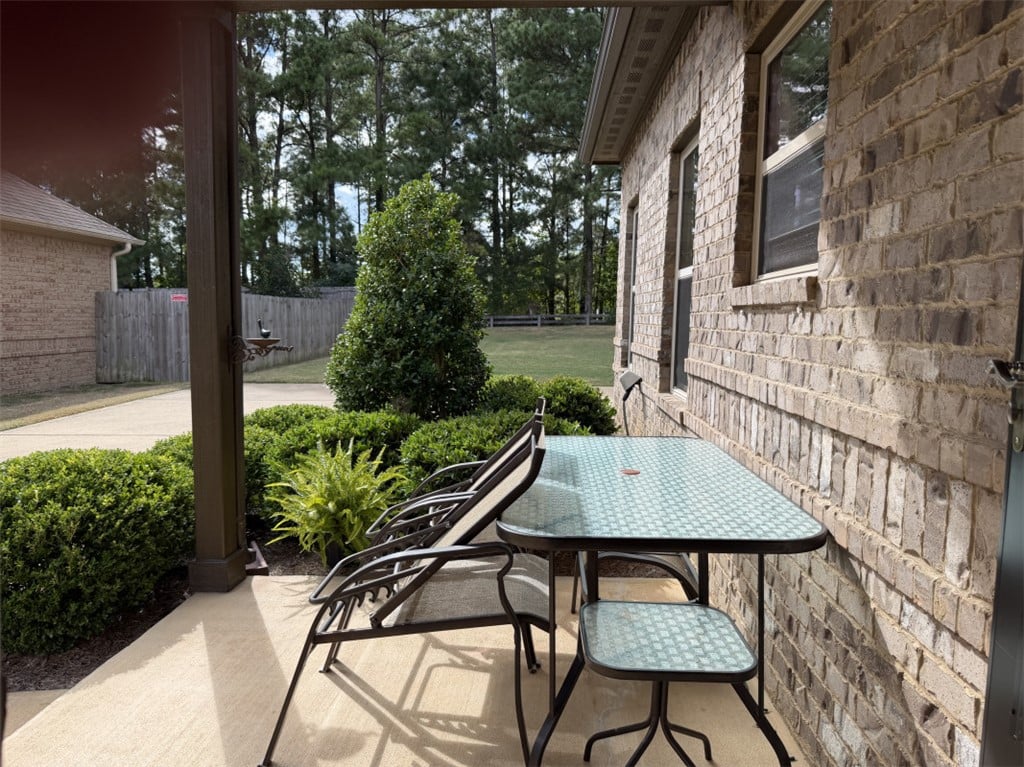 2630 Mimms Ln, Auburn, AL 36832, Brick exteriors frame this covered outdoor space o