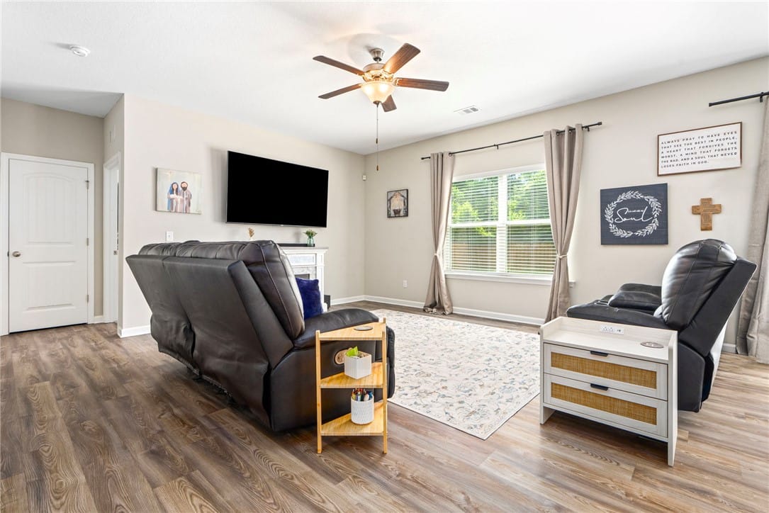 45 Wood Hl Dr, Smiths Station, AL 36877, A comforting living room featuring durable wood fl