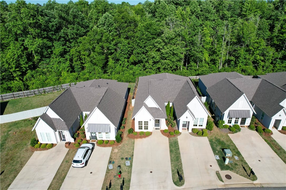 1254 Burrow Cir, Opelika, AL 36801, These charming homes feature ample green spaces an