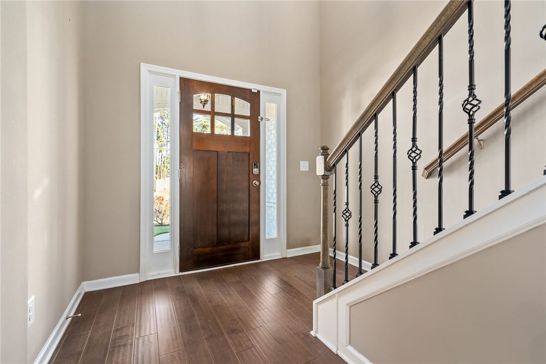 2704 Dunkirk Ct, Auburn, AL 36832, Rich hardwood floors welcome guests to a grand ent