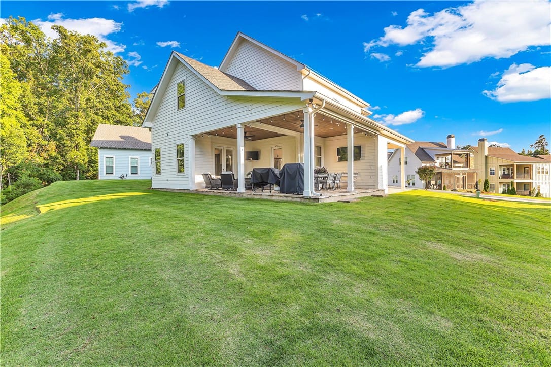 82 Hideaway Lp, Dadeville, AL 36853, A spacious covered patio with white columns extend