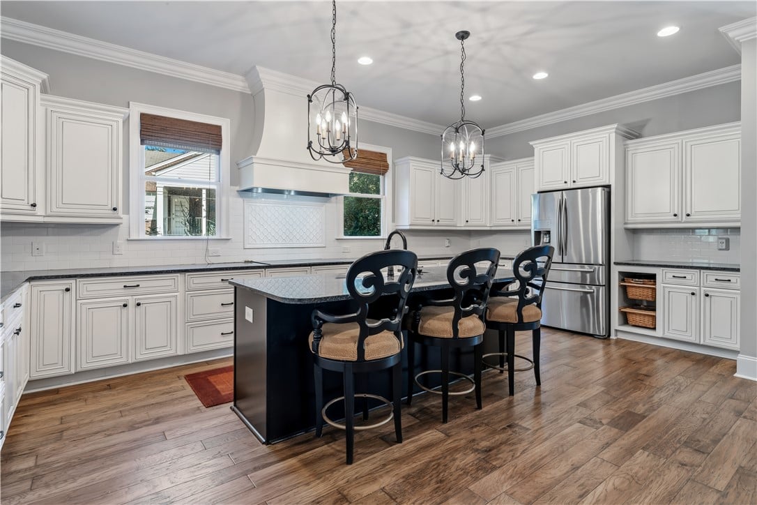 482 Dumas Dr, Auburn, AL 36830, Gleaming hardwood floors run through a spacious cu
