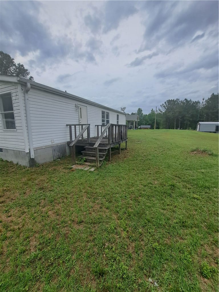287 LEE ROAD 169, Salem, AL, 36874, A classic white-sided residence with wooden deck a