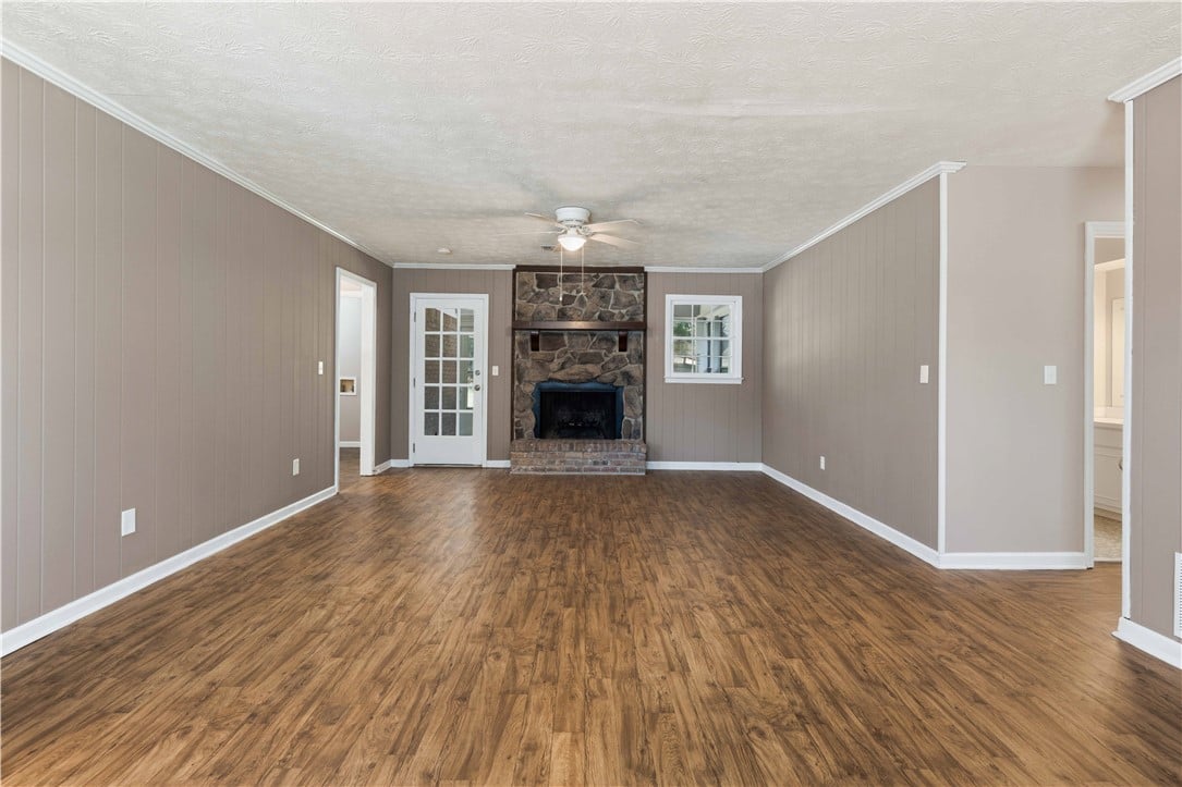 6554 Lemans Ln, Columbus, GA 31909, USA, A spacious common area showcases rich hardwood flo