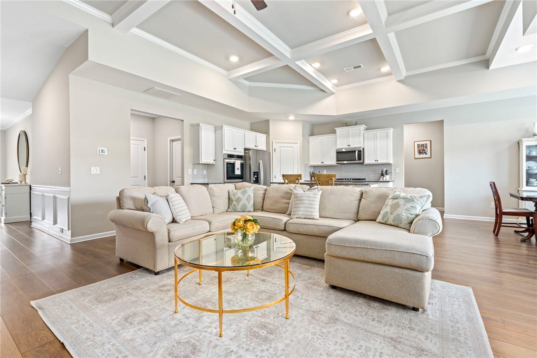 2106 Forrest Cv Dr, Auburn, AL 36879, A well-lit great room features an open floorplan w