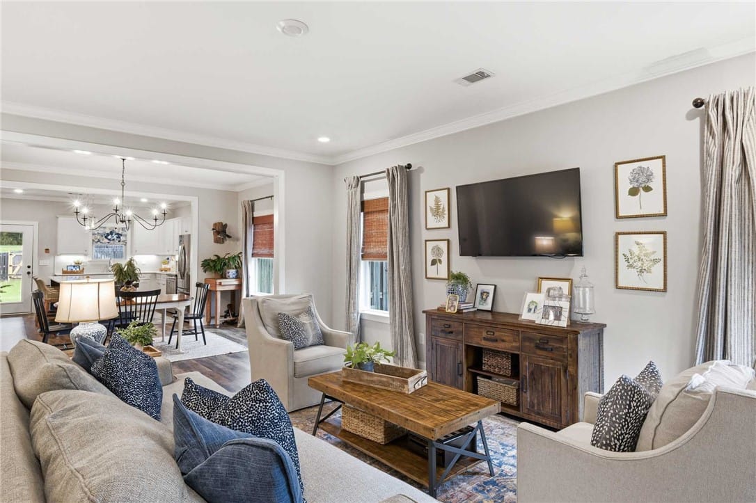 172 Northern Flicker Ct, Auburn, AL 36832, An inviting open-concept living area seamlessly co