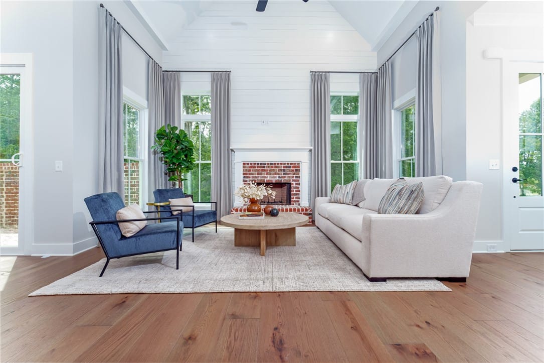 2176 DAWSON CORNER, Auburn, AL, 36832, This airy living room features high ceilings, a fi
