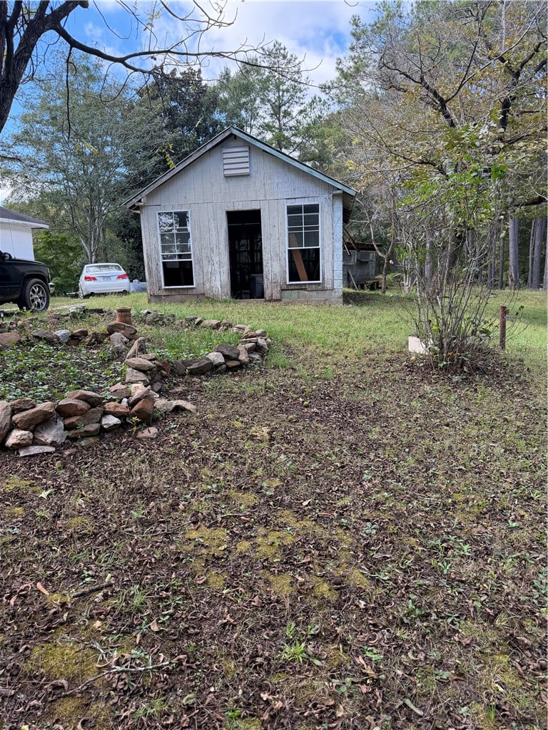1418 Hopewell Rd, Valley, AL 36854, A detached wood outbuilding offers useful storage