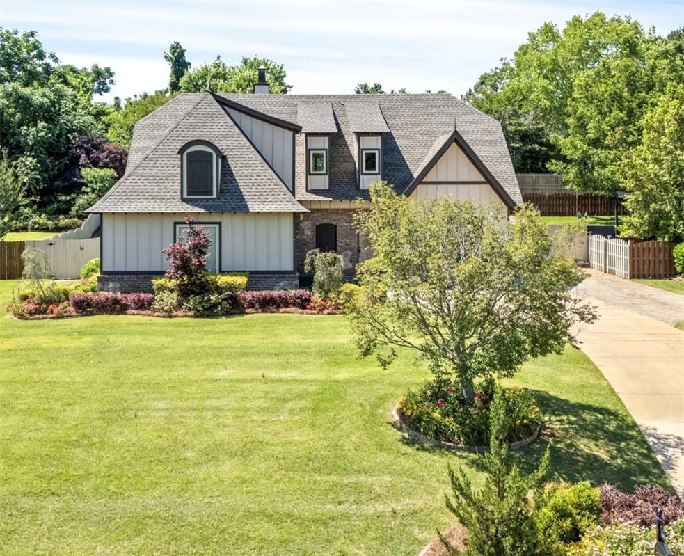 3205 Pinecrest Dr, Opelika, AL 36801, A classic facade with charming dormers and lush la