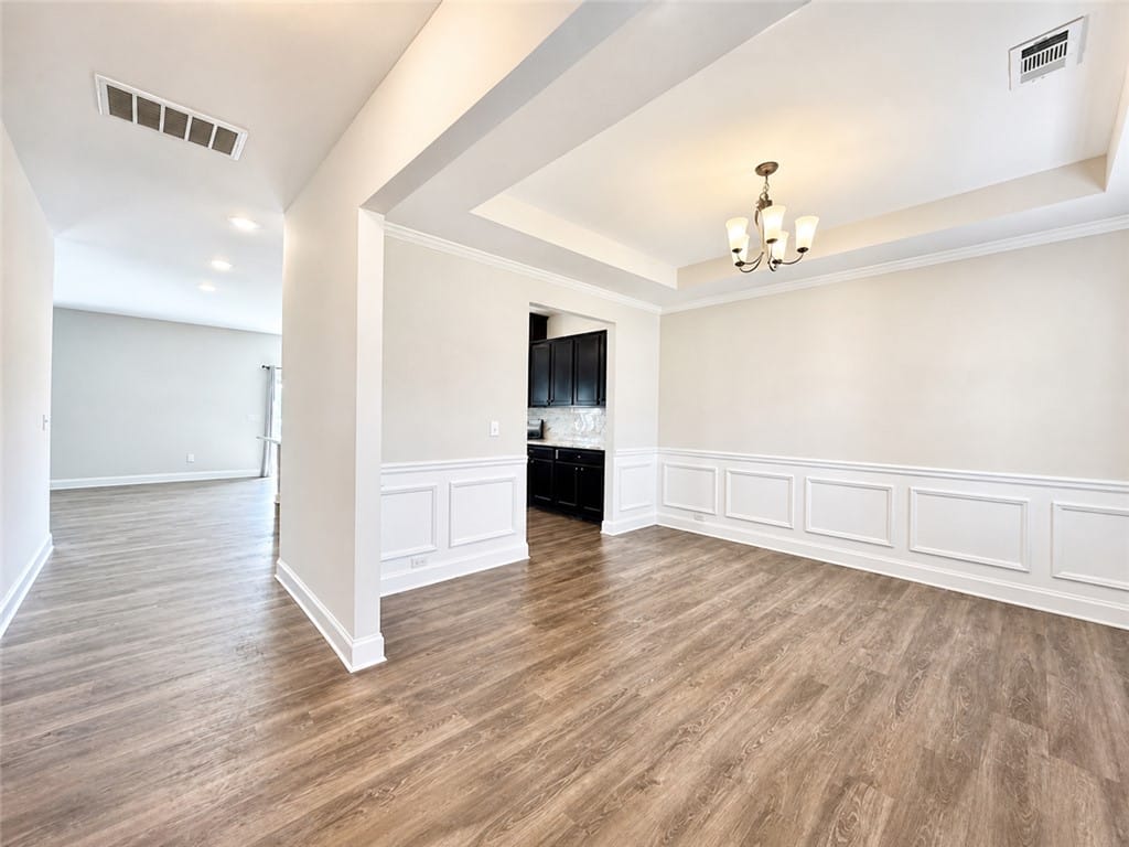 190 Red Oak Pl, Smiths Station, AL 36877, This versatile dining area boasts elegant wainscot